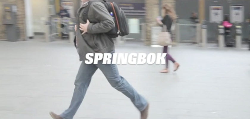 People running for trains in slow motion