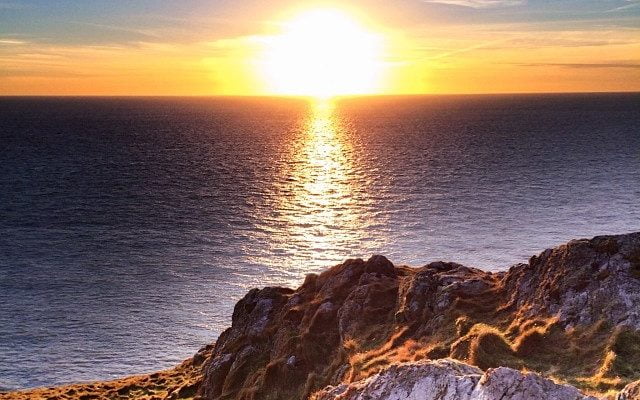 Sunset off South Stacks, Anglesey by allthatmalarkey